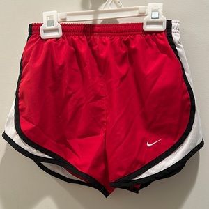 Red Nike shorts